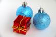 Two christmas bulbs and gift