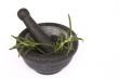isolated mortar with rosemary