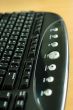Computer multimedia keyboard