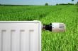 Radiator on a green field
