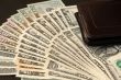 US dollars and leather wallet