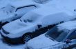 Snowed cars after night snowfall