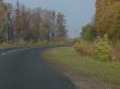 Autumn road with deep blue sky