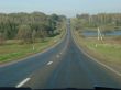 Autumn road with deep blue sky