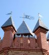 Castle, Towers with Feathers Upon Blue Sky
