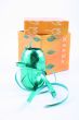 green ribbon and colorful box