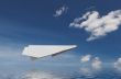 Paper plane above water