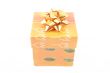 colorful box with golden ribon isolated