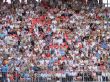 crowd of countless people spectators