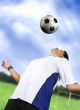 footballer chesting the ball