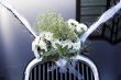 flowers on wedding car