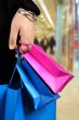 carrying shopping bags in shopping centre