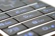 Close up shot of mobile keypad under light