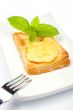Fork and apple tart on a dish