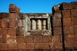 Window of an ancient stone wall in Siem Reap