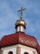 Orthodox Church with red Cupola with Holy Cross