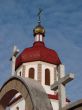 Orthodox Church with red Cupola with Holy Cross