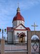 Orthodox Church with red Cupola with Holy Cross