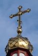 Orthodox Church`s Cupola Cross upon blue sky