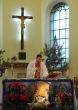 Roman catholic pastor praying inside dome