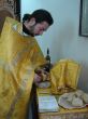 Orthodox priest prepares Sacred Participle foods