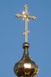 Orthodox Church`s Cupola Cross upon blue sky