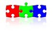 Three puzzle pieces in RGB colors