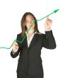 Business woman pointing at graph