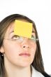 business woman with post it note