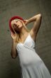 standing woman with hat