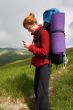 Backpacker girl with phone
