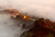 Houses between the fog