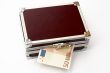 Fifty  euros on metal briefcase