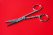scissors on a red background