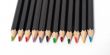 Colored school pencils stacked. Macro