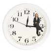 business woman sitting on clock