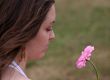 admiring a beautiful flower - girl sally