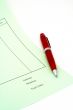 Blank invoice with pen