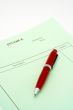 Blank invoice with pen