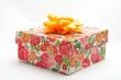 Gift box with yellow ribbon