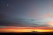 The moon over the sunset