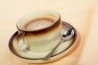 Close-up of a cup of coffee with the spoon