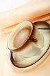 Close-up of a cup of coffee with the spoon