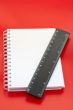 White notebook and measure
