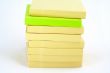 Yellow and green Blank Post-it papers stack