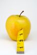 Apple with tape measure