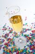 Champagne glass and confetti