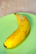 Banana on green plate