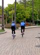 Blue Cyclists on Path