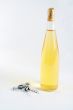 Corkscrew and bottle of wine